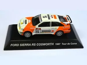 WOW ESTREMAMENTE RARO FORD SIERRA RS COSWORTH SAINZ CORSE 1987 WRC 1:64 CM Kyosho - Foto 1 di 3