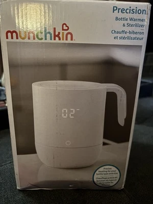 Calentador y esterilizador rápido de biberón Munchkin - se calienta en 60 segundos Foto 1 de 4