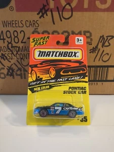 1994 Matchbox #35 Super Fast-Outlaw PONTIAC STOCK CAR Black-Blue w/6Spoke Sprial - Picture 1 of 5