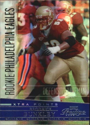 2006 Playoff Prestige Xtra Points Blue #165 Brodrick Bunkley Rookie RC Card - Image 1 of 2