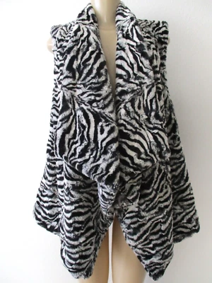 Chaleco de piel sintética Michael Kors negro blanco estampado animal sin mangas talla L nuevo con etiquetas Foto 1 de 4