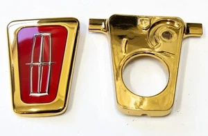 1993-96 Lincoln Mark VIII trunk lock cover emblem assembly *GOLD* - Picture 1 of 5