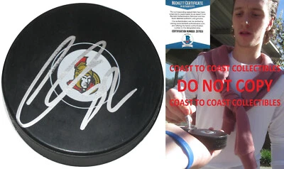 Thomas Chabot signed Ottawa Senators logo Hockey puck exact proof Beckett COA - Image 1 of 4