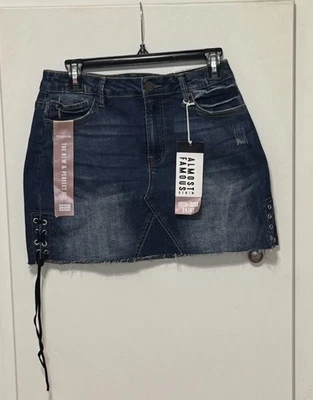 Falda vaquera casi famosa para mujer junior talla 9 falda tiro alto corbatas lavado oscuro Foto 1 de 4