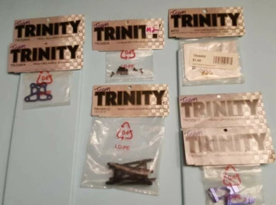 Team Trinity parts TRI30512 Suspension Arm, TRI30904 Bulkhead TRI30910  TRI4450 - Image 1 of 4