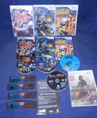 Wii; Attack of the Movies 3-D, Monster Hunter 3, Destroy All Humans Big Willy, + - Image 1 of 4