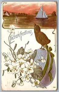 Postcard c1910 Easter Greetings Embossed Chick on Egg Sailboat Lillies Scenic - Picture 1 of 2