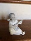 Lladro Black Cherub Glazed Porcelain Figurine Playing The Lute