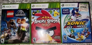 Xbox 360 Angry Birds Trilogy W/Manual , Sonic Free Riders, & Lego Jurassic World - Picture 1 of 4