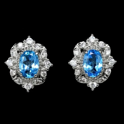GENUINE AAA SWISS BLUE TOPAZ OVAL & WHITE CZ STERLING 925 SILVER STUD EARRING - Image 1 of 4