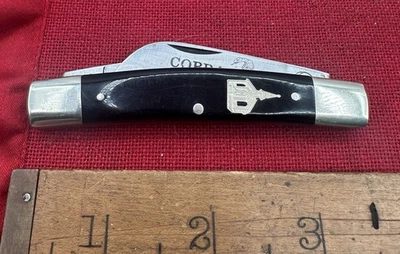 CUCHILLO CAMPANARIO IGLESIA NEGRO 2 HOJAS BUCK CREEK COBRA CONGRESS SOLINGEN ALEMANIA Foto 1 de 4