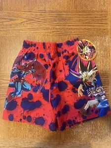 YU GI OH Jungen Badehose rot Gr. 4/5 Gummibund innen Netzfutter Yu-Gi-Oh! - Bild 1 von 3