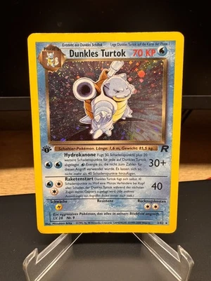 Pokemon Karte 1. Auflage Dunkles Turtok 3/82 Holo Team Rocket 2000 Deutsch  - Bild 1 von 2
