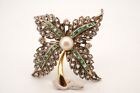 19.2K gold brooch with diamonds, emeralds and pearl.