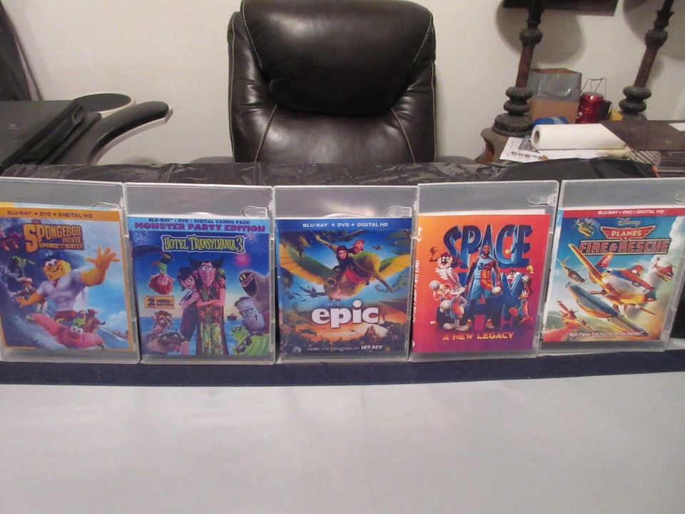5 Movie Lot = Space Jam, SpongeBob, Epic, Fire & Rescue, H' Transylvania  "Read" - Image 1 of 4
