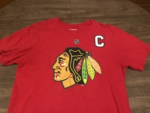 Camiseta roja mediana Chicago Blackhawks Toews 19 NHL hockey Reebok - Imagen 1 de 9