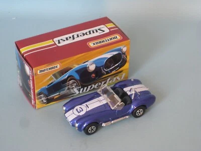 Coche deportivo Matchbox Superfast 1965 Shelby Cobra 427 S/C púrpura EE. UU. 70 mm en caja Foto 1 de 3