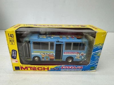 Coche miniatura Y9719 TOY EPOCH Doraemon Kindergarden autobús Japón transporte vintage Foto 1 de 4