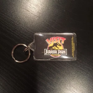 NEW 1993 Vintage Visit Jurassic Park Keychain Double Sided NOS - Picture 1 of 2