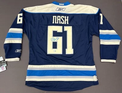Camiseta deportiva firmada por Rick Nash Reebok azul alterna con etiquetas BGS/BAS CERTIFICADO DE AUTENTICIDAD SMJ Foto 1 de 4