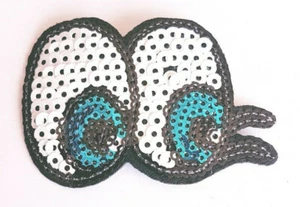 SEQUIN OJOS DIBUJOS ANIMADOS NIÑOS HOTFIX COSER APLIQUES MOTIVO PARCHE FESTIVAL - Imagen 1 de 1