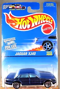 1996 Hot Wheels Blue/White Card #609 JAGUAR XJ40 Dark Blue w/Chrome Lace Spokes - Picture 1 of 5
