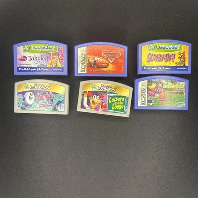 LeapFrog LEAPSTER GAME LOT - 6 Cartridges - Cars, Scooby-Doo, Tangled - Untested - Image 1 of 4