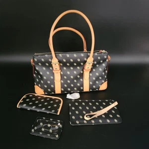 Bolso de mano Dooney & Bourke vintage de cuero negro Y2K con juego de muñeca. - Imagen 1 de 18