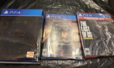 PlayStation 4 bundle Dark Souls Trilogy,Assassins Creed mirage, & The Last Of Us - Image 1 of 4