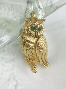Ciondolo profumo gufo Max Factor vintage tono oro occhi strass verdi senza catena - Foto 1 di 6