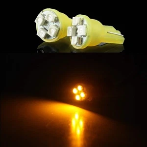 2X LUCI DI POSIZIONE LED GIALLE XENON T10 4 SMD lampadina auto 12V W5W fari moto - Imagen 1 de 1