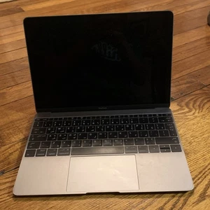 Pour pièces - MacBook Air - A1534 - Pas d'achat à découper - Pas d'alimentation - Photo 1/13