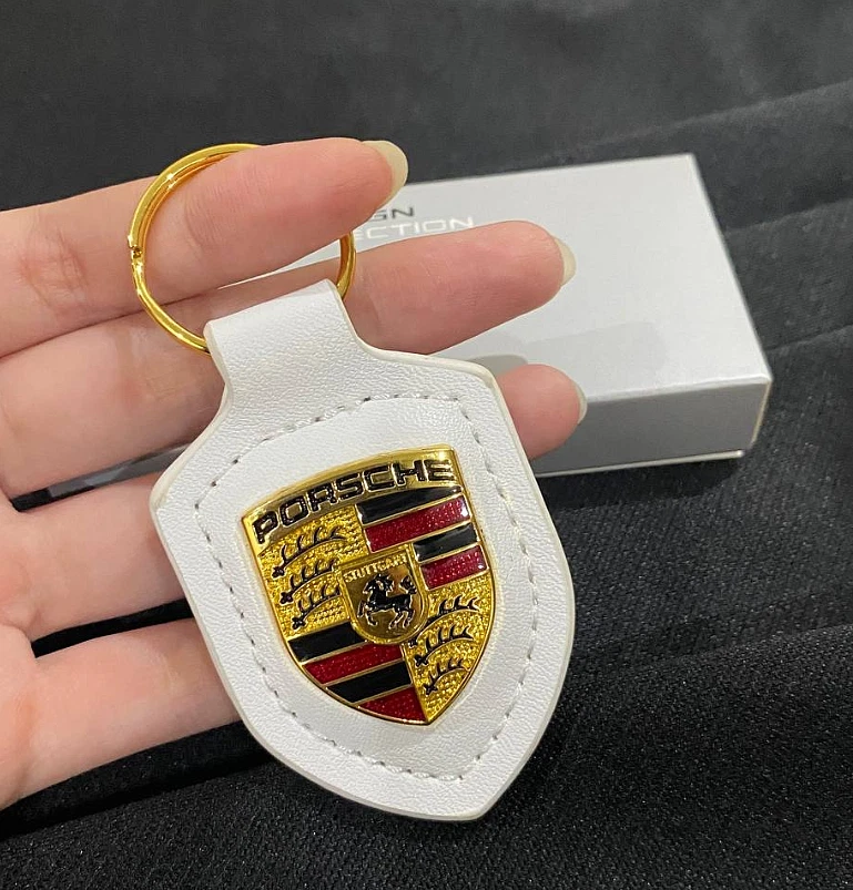 NUEVO Llavero con escudo de cuero genuino Porsche - Llavero blanco OEM WAP0500950E Foto 1 de 4