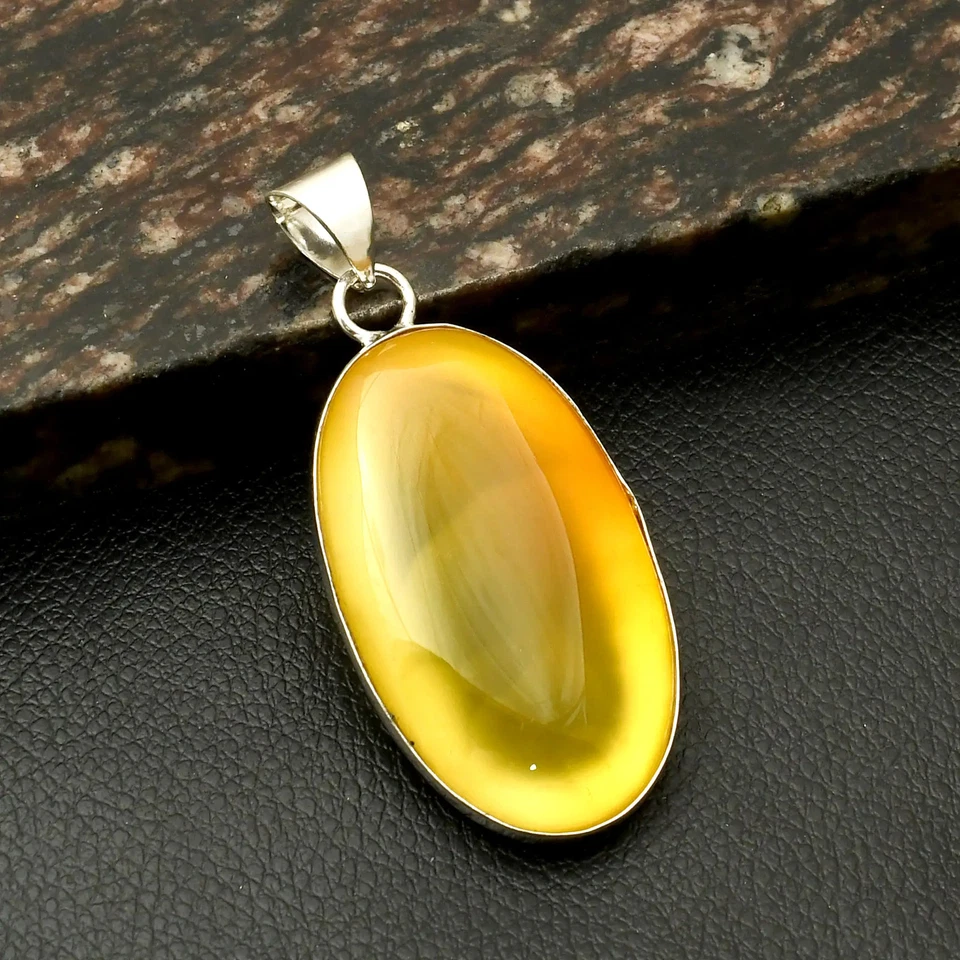 Joyería colgante étnica hecha a mano de piedras preciosas de ónix amarillo para Navidad 2,6" AP-42320 Foto 1 de 1