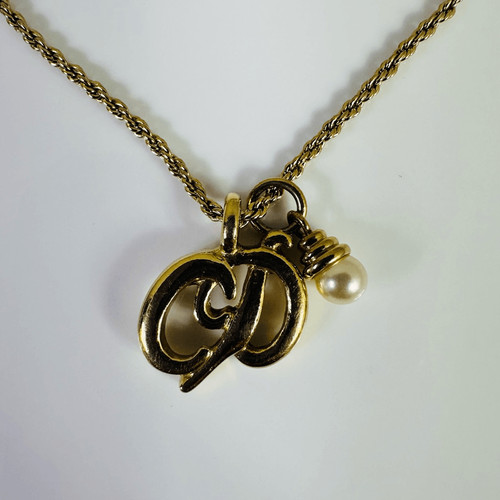 Collana con ciondolo perle finte logo CD Christian Dior tono oro