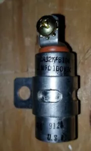 312-0149 ONAN CONDENSER .1 MFD100 VDC CA32kfb104 CDE 9128 CAPACITOR nos - Picture 1 of 9