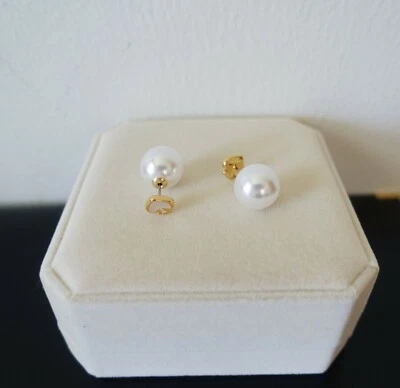 Pendientes reversibles con logotipo/perla de Kate Spade Foto 1 de 4