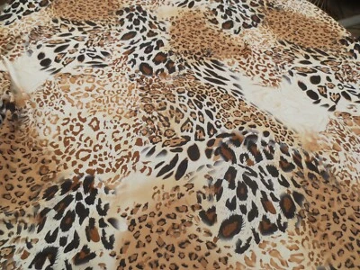 TELA DE GASA GUEPARDO MARRÓN TOSTADO NEGRO ESTAMPADO ANIMAL GUEPARDO TRANSPARENTE 4 YARDAS Foto 1 de 4