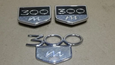 Juego emblema maletero trasero lateral Chrysler 300M 1999-2004 Foto 1 de 4