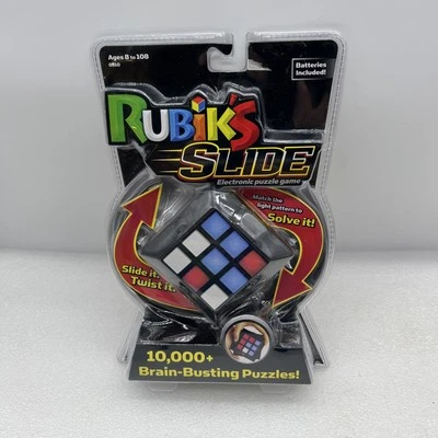 Rubik’s Slide Juego de Puzzle Electrónico 10.000+ Rompecabezas Rompecabezas! Nuevo SELLADO Foto 1 de 2