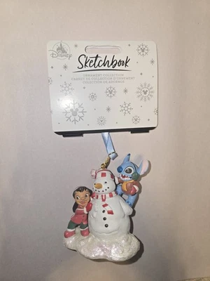 NEW Disney Parks 2025 Lilo And Stitch Snowman Sketchbook Christmas Ornament NWT - Image 1 of 2
