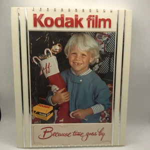 VINTAGE 11” x 13.5” KODAK 35 MM FILM CHRISTMAS HARD PLASTIC STORE DISPLAY 1985 - Picture 1 of 11