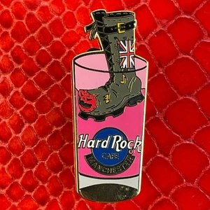 MANCHESTER UK🎸HARD ROCK CAFE®HRC PIN🇬🇧GREY BOOTS IN A PINK GLASS FLAG NOTES🎗 - Picture 1 of 4