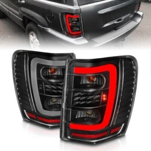 ANZO 311394 for 1999-2004 Jeep Grand Cherokee LED Tail Lights W/ Light Bar Black - Picture 1 of 11