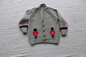 handgestrickte babykleidung - Bild 1 von 2