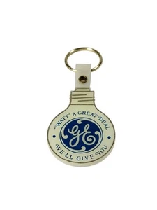 Portachiavi vintage GE General lampadina elettrica portachiavi bagliore al buio USA - Foto 1 di 4