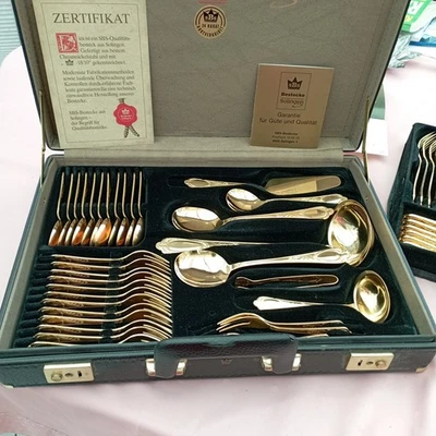 SBS Besteck 70-teilig 23/24 Karat hartvergoldet - Modell 25 Wien mit Koffer - Bild 1 von 4