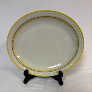 Shenango China Piatto da portata ovale cerchi in rilievo V-36 giallo vintage - Foto 1 di 6