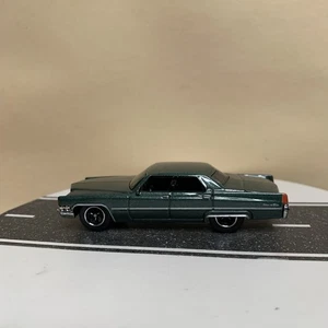 2009 Matchbox #7 1969 Cadillac Sedan Deville 4-Door Dark Green Metallic 1:64 NM - Picture 1 of 12