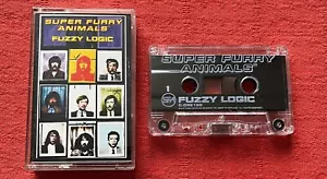 SUPER PELZIGE TIERE - KASSETTENBAND - FUZZY LOGIC - 1996 UK AUSGABE AUF SCHÖPFUNG - Bild 1 von 7